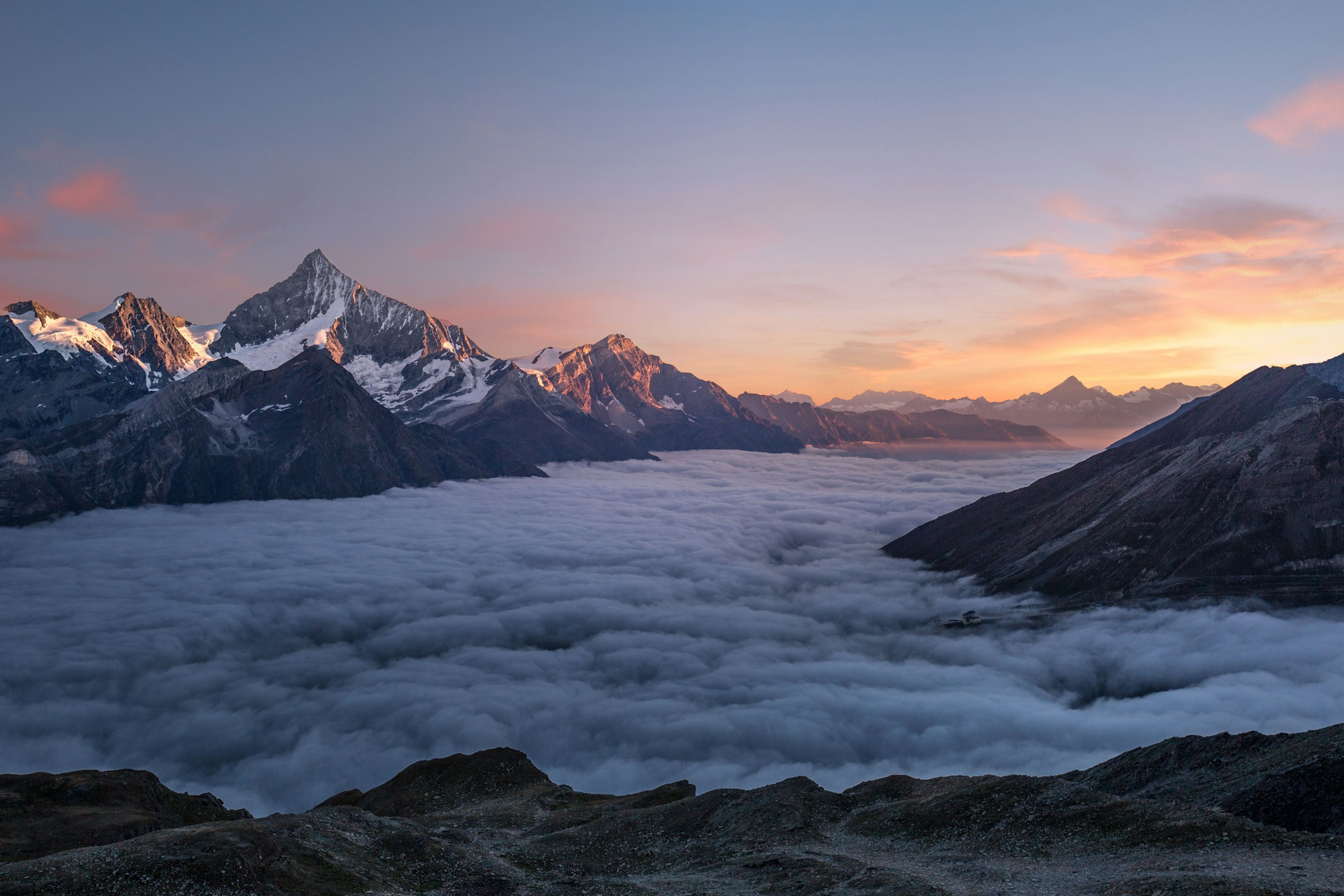 Snow-capped alpine mountain peaks