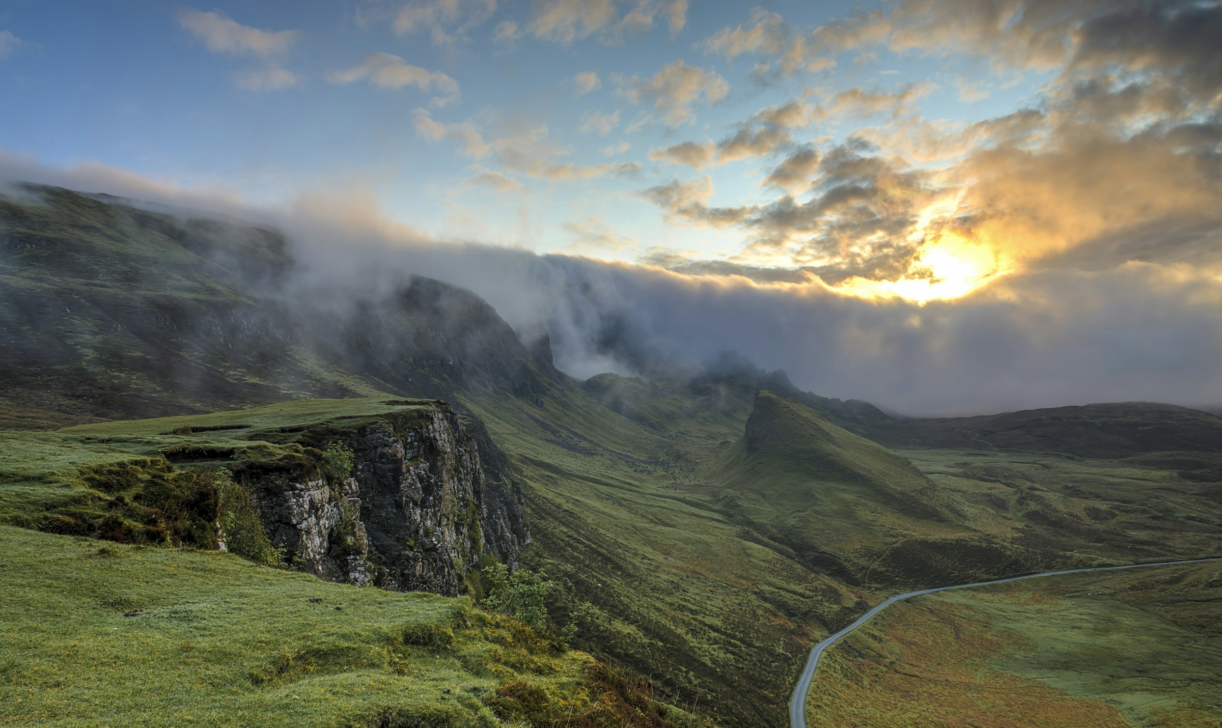 Misty mountain valley at dawn